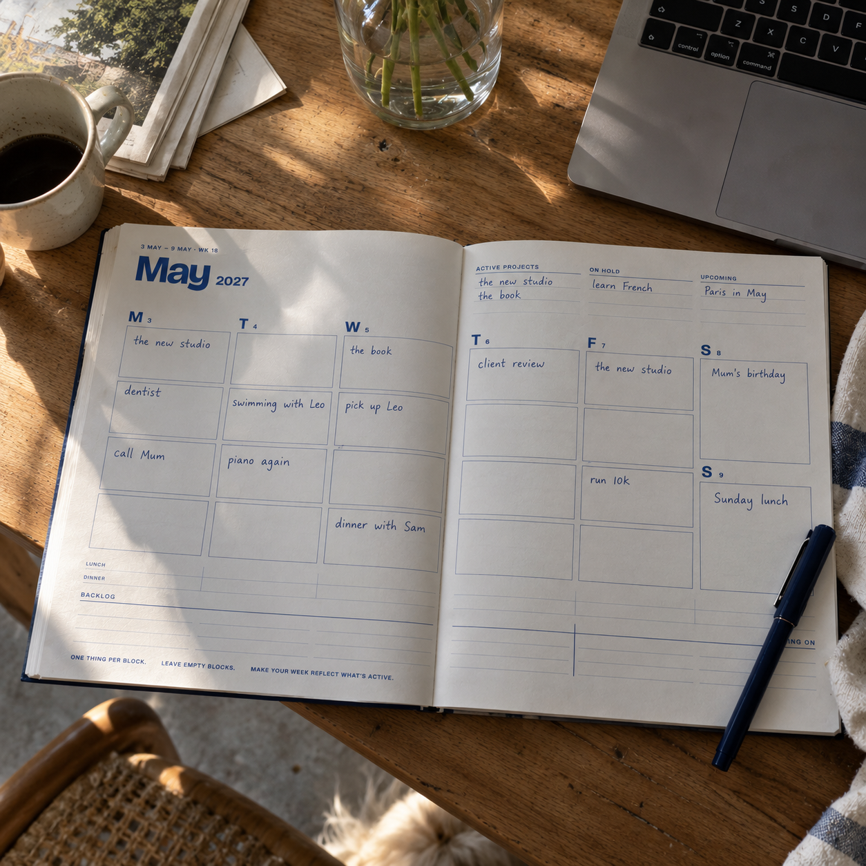The LIUBAI planner open on a desk, a week partly filled in